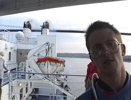 Julian on deck after passing under the Sotra Bridge